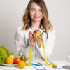 young nutritionist doctor writing diet plan healthy eating 118454 13835 1