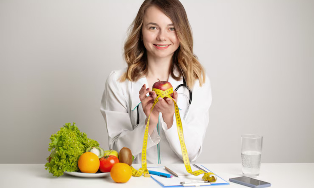 young nutritionist doctor writing diet plan healthy eating 118454 13835 1