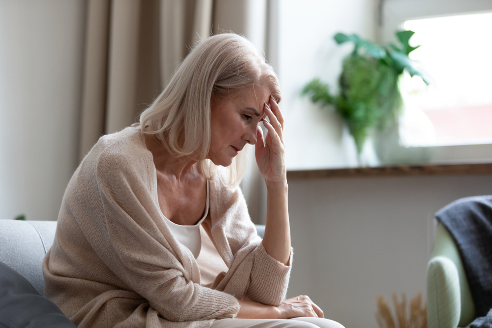 Woman experiencing menopause symptoms considering hormone therapy in Palm Harbor FL